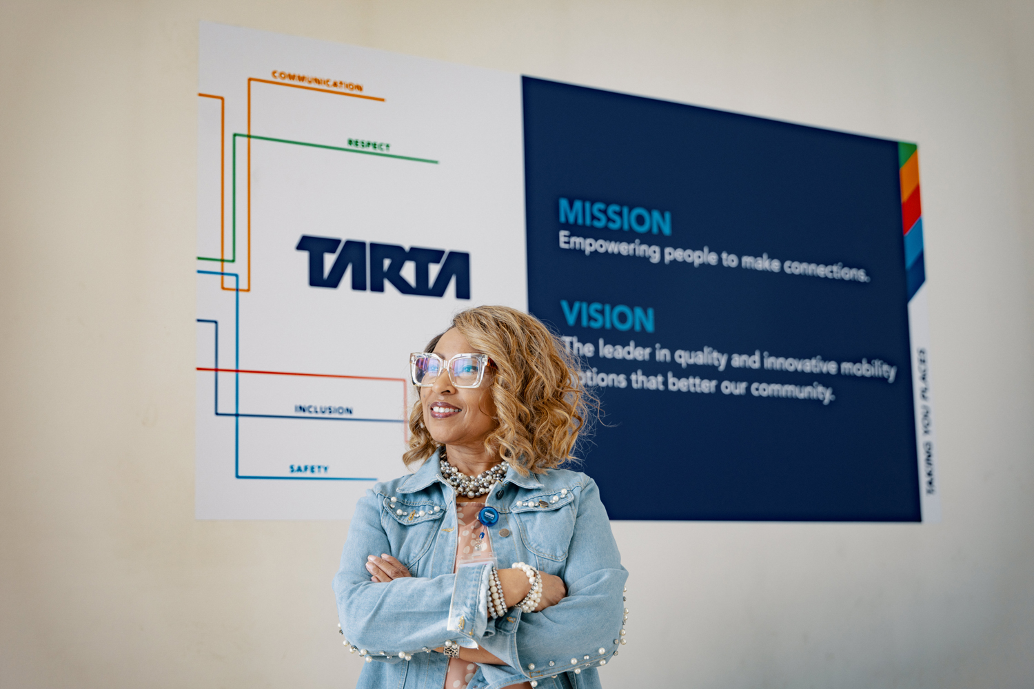 Woman in front of TARTA sign
