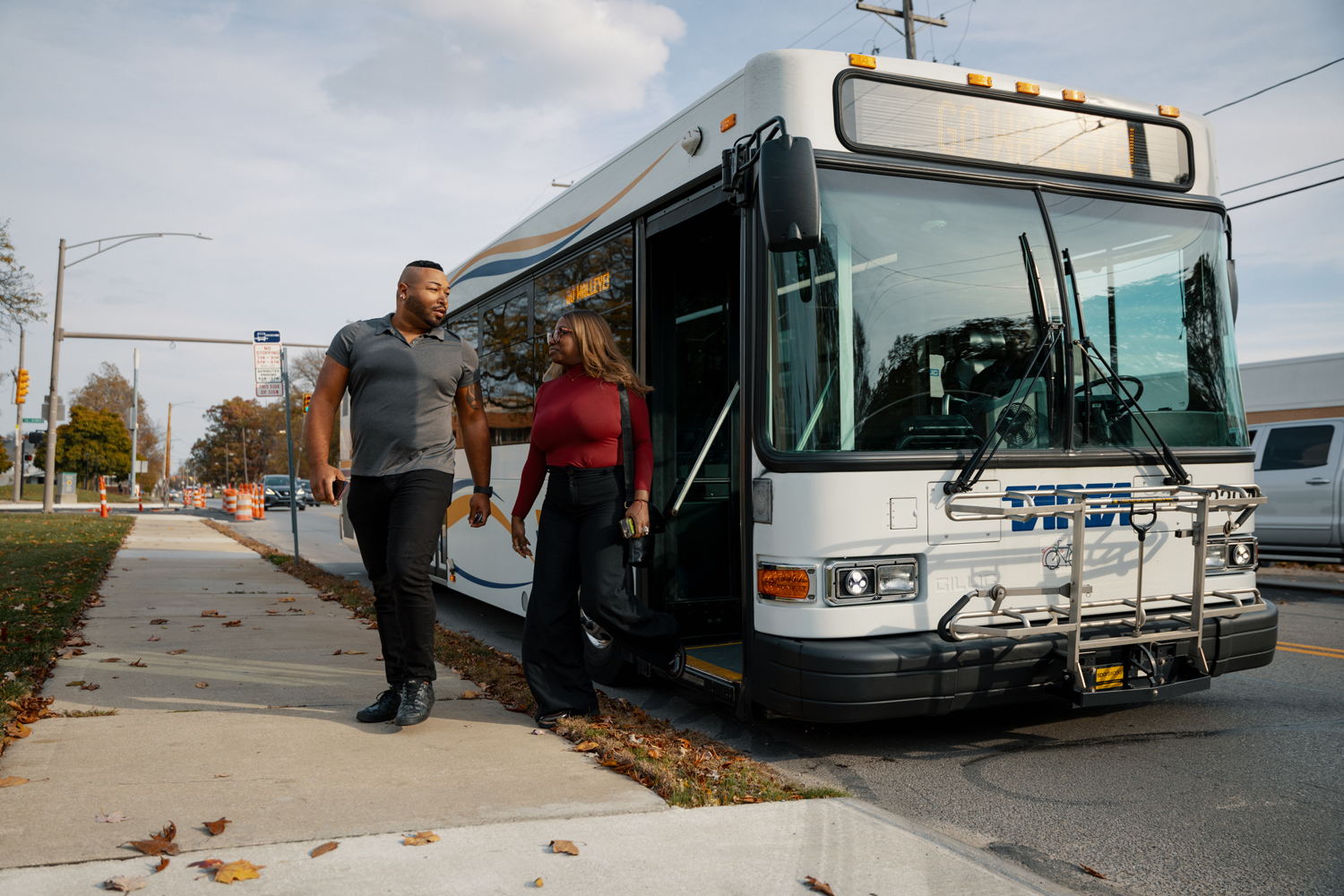 People departing a bus