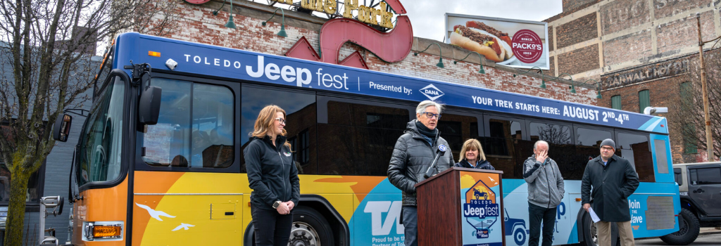 Press conference in front of TARTA's Jeep Fest wrapped bus in front of Tony Packo's.